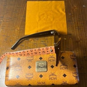MCM signature color sunglasses. Being  sold with the original box and cloth.